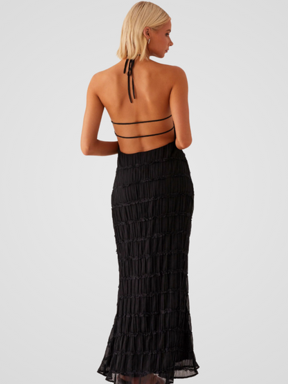 Alizée™ | Geplooide halterjurk met luchtige textuur en elegante flow