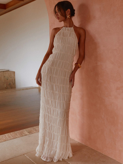 Alizée™ | Geplooide halterjurk met luchtige textuur en elegante flow